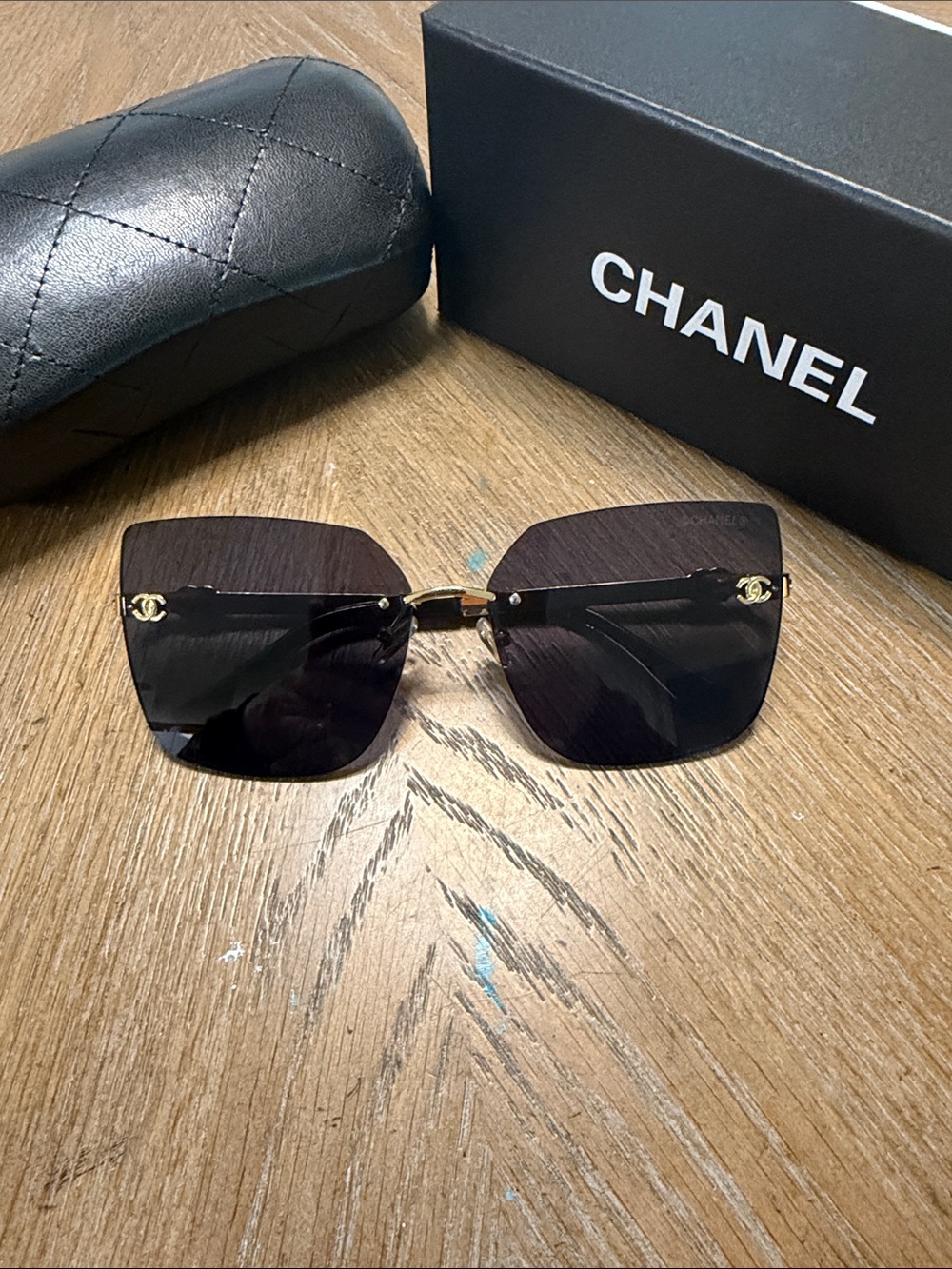 CHANEL Black Rimless Square Sunglasses with Gold CC Accents - Picture 5 of 10